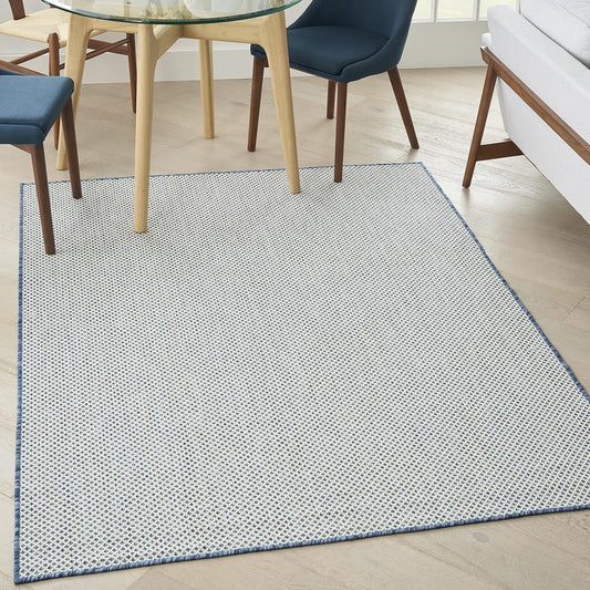 Nourison Home Courtyard 60" x 84" Fabric Indoor/Outdoor Rug in Ivory Blue